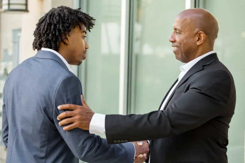 Two men talking